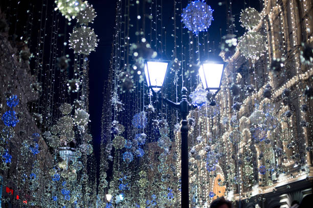 istock Christmas street decoration with lantern 1345561194