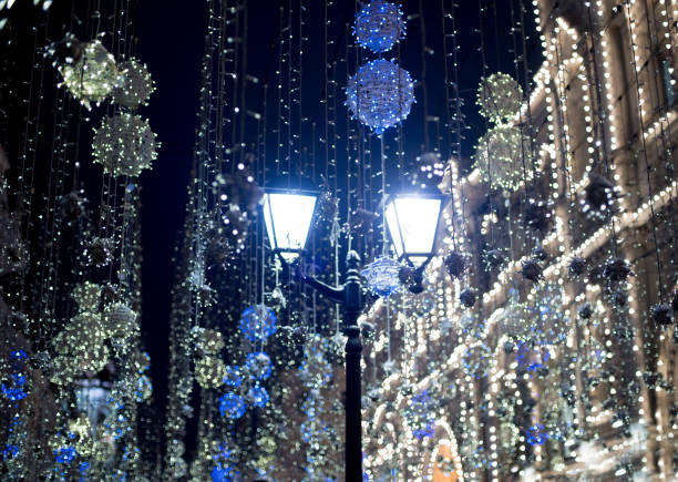 istock Christmas street decoration with lantern 1345561243
