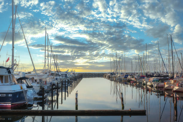 istock Boat jetty with yachts on a pier in the morning 1345563671
