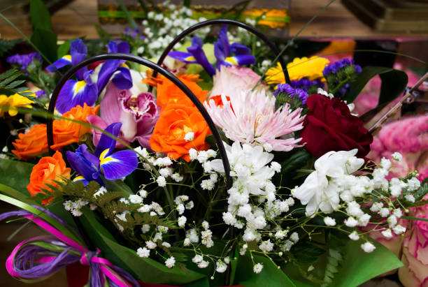 istock Multicolor flower bouquet background. Asters, lillies, roses 1345564021