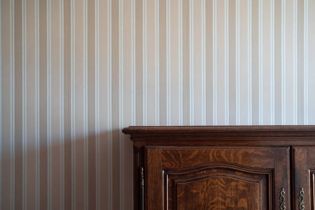 istock vintage drawer cabinet against a wall with stripes 1345564860