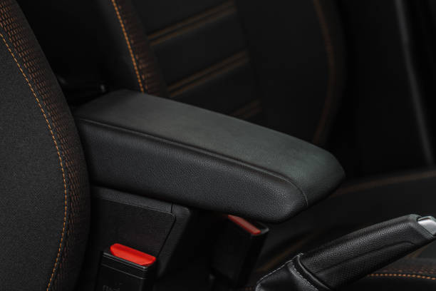 istock Car armrest opened. Opened armrest in the car for driver. 1345565086