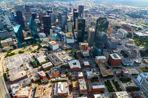 The beautiful modern skyline of Dallas, Texas shot aerially from an altitude of about 800 feet.