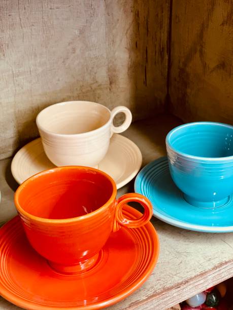 istock Bright colorful vintage dinnerware in rustic cupboard - stock photo 1345574967