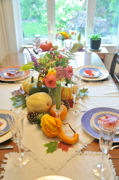 istock Autumn harvest decor on home dining table for family Thanksgiving dinner celebration 1345576806