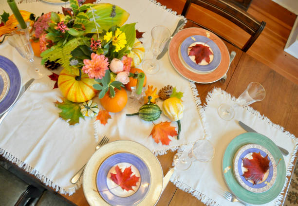 istock Autumn harvest decor on home dining table for family Thanksgiving dinner celebration 1345576827