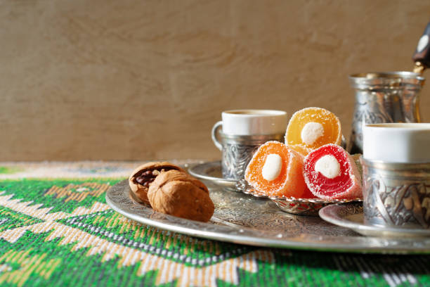 istock Turkish Coffee served with Turkish Delight on metal tray 1345583605