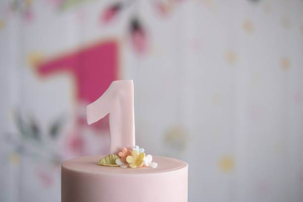 istock one year old baby birthday cake ready to eat 1345588359
