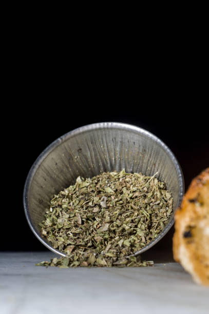 istock toast with oil and oregano on a white board 1345588578