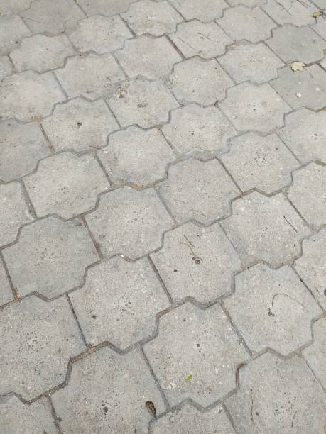 istock Gray paving tiles for background 1345591813