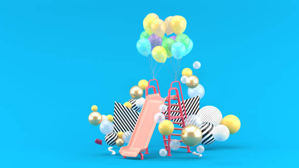 Children slide and balloons among colorful balls on blue background.-3d rendering. stock photo
