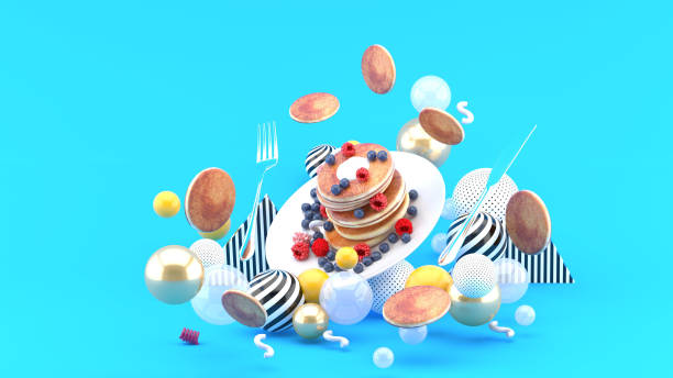 Pancakes and berries among colorful balls on a blue background.-3d rendering.