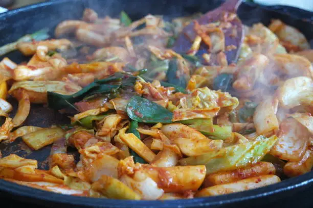 Dak galbi, traditional Korean food preparation. Fried chicken with spice sauce and vegetable. Chuncheon, Korea Dakgalbi, traditional food