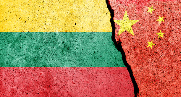 Lithuanian and China flags painted on the concrete wall Lithuanian and China flags painted on the concrete wall lithuania stock pictures, royalty-free photos & images