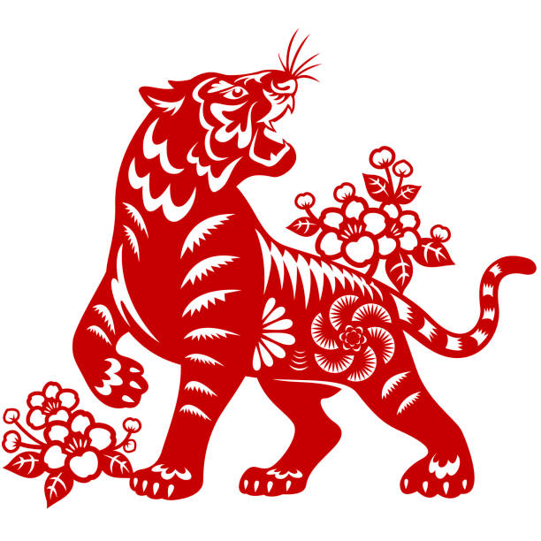 Year of the Tiger Papercut Celebrate the Year of the Tiger with the red colored paper cut, and the tiger is the Chinese Zodiac sign for the Chinese New Year 2022 papercutting illustrations stock illustrations