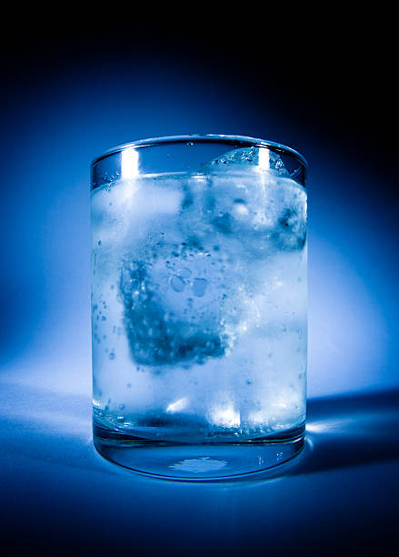 istock misted over glass of water with ice 134560400