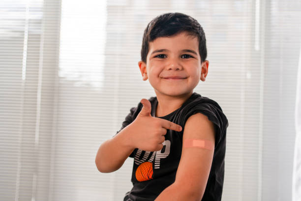 Vaccinated child Showing Shoulder After Shot stock photo