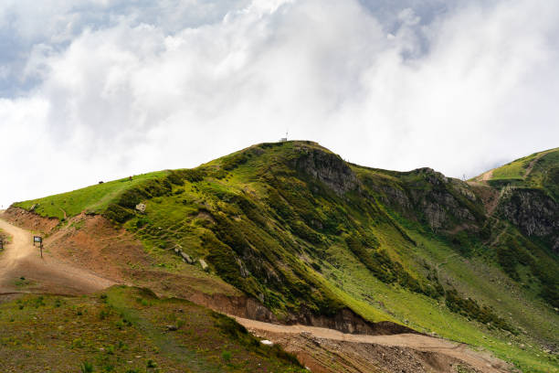 istock Scenic green mountains and beautiful sky clouds for background 1345605277