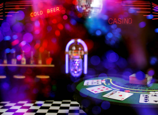 istock Miniature Poker Table Bar Scene Composite Image With Neon Signs and Bokeh 1345606464