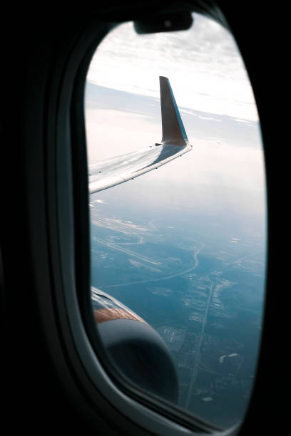 istock View from an airplane window outside at the wing 1345618134