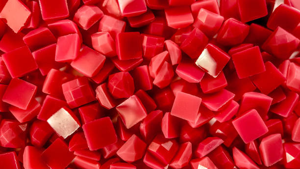 istock Close-up, red square diamonds for diamond embroidery. Hobbies and DIY, materials for creating diamond embroidery 1345619382