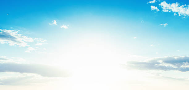 istock Blue sky background with clouds and copy space. Banner. 1345623543