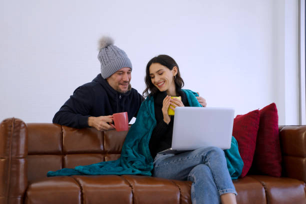 istock Couple Celebration for Christmas in the house. 1345625596