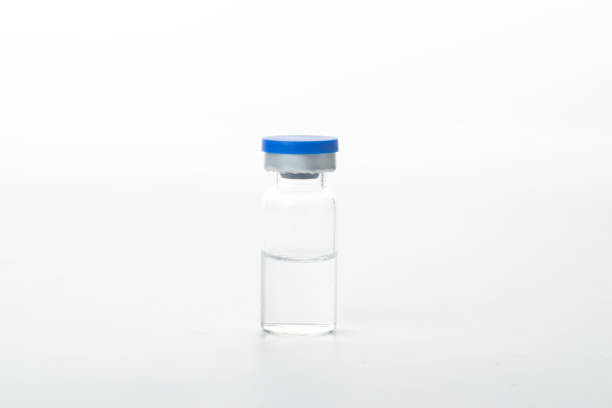 istock The syringe and vaccine are on a white background 1345626948