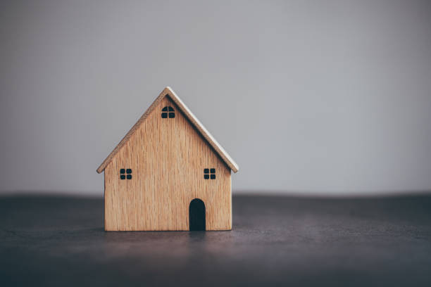 istock House wood model on table background 1345632238