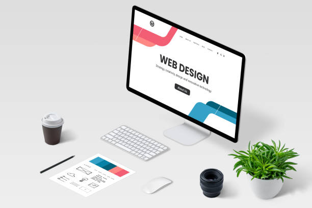 istock Isometric view of web designer work desk with computer display and modern web page concept. 1345633440