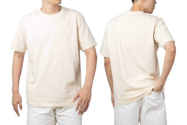 istock Young man in blank beige t-shirt mockup front and back used as design template, isolated on white background with clipping path 1345634529