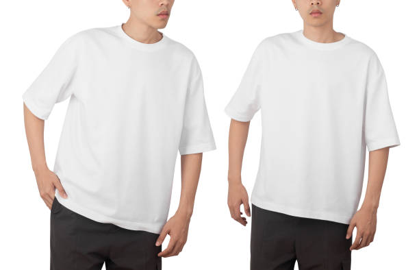 istock Young man in blank oversize t-shirt mockup front and back used as design template, isolated on white background with clipping path 1345634539