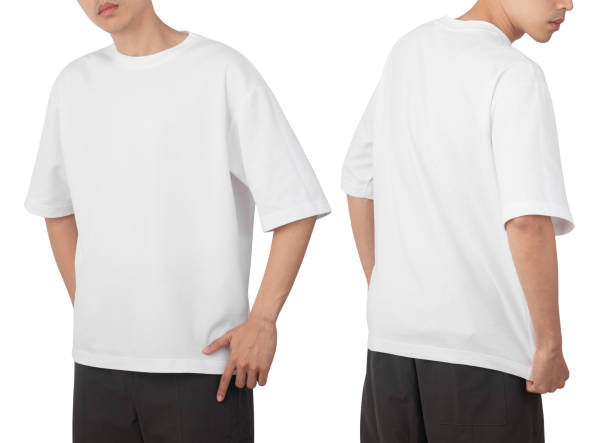 istock Young man in blank oversize t-shirt mockup front and back used as design template, isolated on white background with clipping path 1345634541