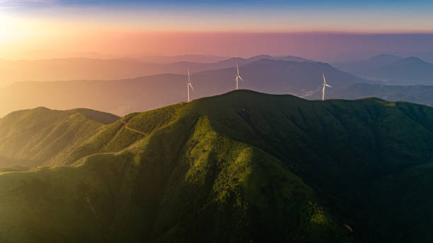 Large-scale wind power generation in mountainous areas Large-scale wind power generation in mountainous areas wind turbine photos stock pictures, royalty-free photos & images