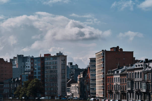 Liège, Belgium - October 10, 2021: View of buildings under a sky with some clouds in Liege