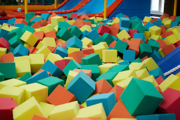 istock Colored soft cubes fill the dry pool for children's jumping 1345635777
