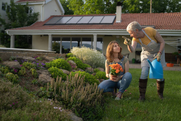 istock A grandmother explaining something to her granddaughter 1345641574