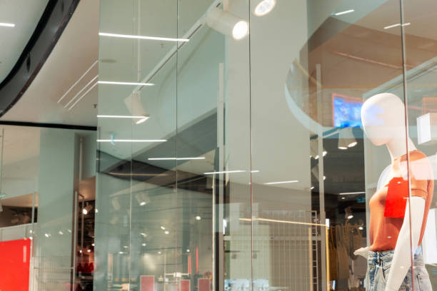 istock Clean store window in shopping mall for logo mockup presentation 1345644431