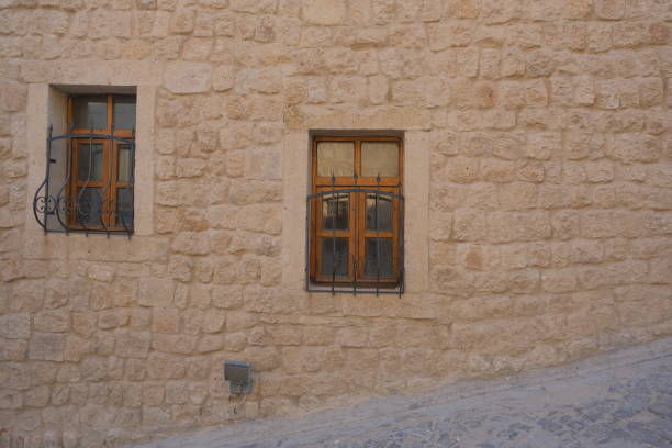 Brownfield and abandoned village house in cappadocia and made of limestone in Nevsehir goreme and beautiful engraving on wall of houses