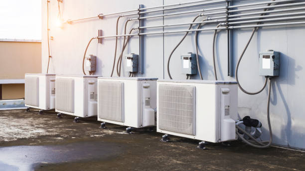 air condition outdoor unit compressor install outside the building. - air duct imagens e fotografias de stock