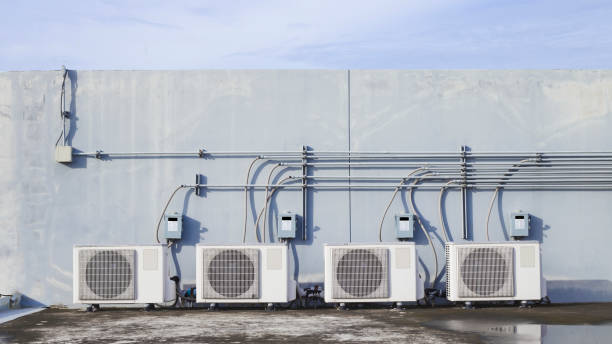 istock air condition outdoor unit compressor install outside the building. 1345645826