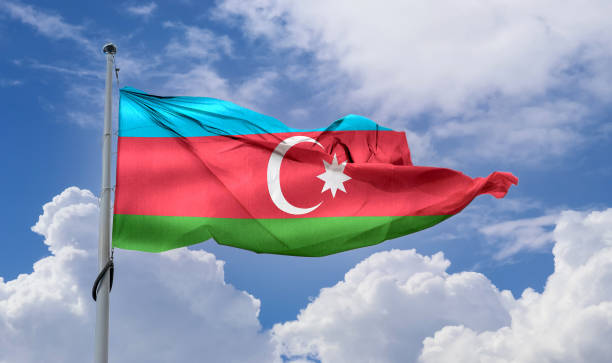 istock Azerbaijan flag - realistic waving fabric flag 1345646995