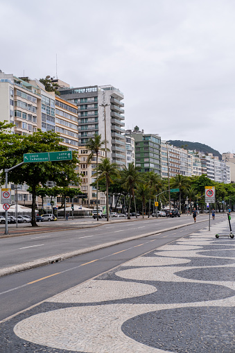 Rio de Janeiro city, Rio de Janeiro state, Brazil October 05, 2021:People exercising in the morning on the sidewalk of the famous Copacabana avenue.