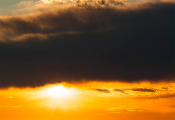 istock Colorful sunset sky with dramatic dark clouds. Only sky, no land. 1345650544