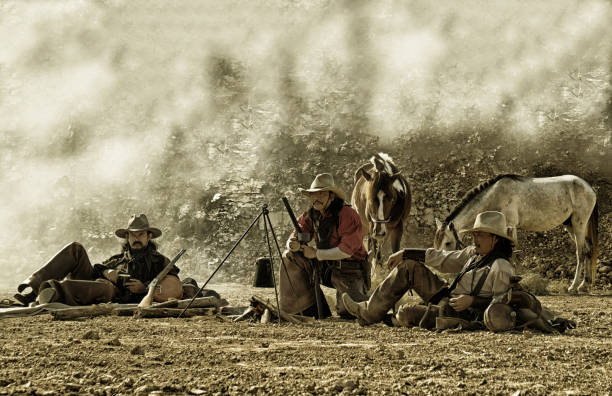 istock Panoramic Shot Of People Sitting On Field 1345654678