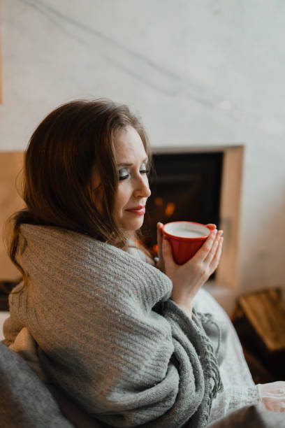 istock Young Woman Drinking Glasses On Table 1345655750