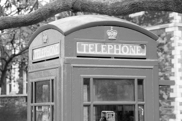 London, United Kingdom - red telephone booth typical for England.