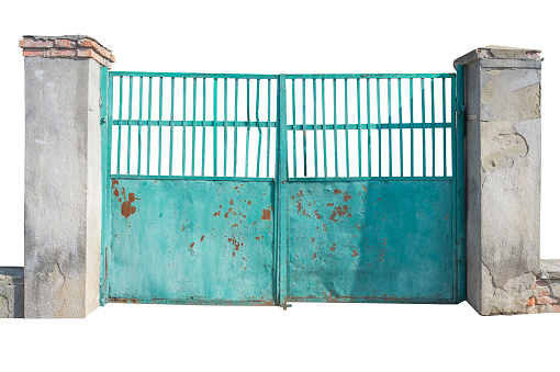 old metal gate with peeling paint and concrete pillars. isolated on white background