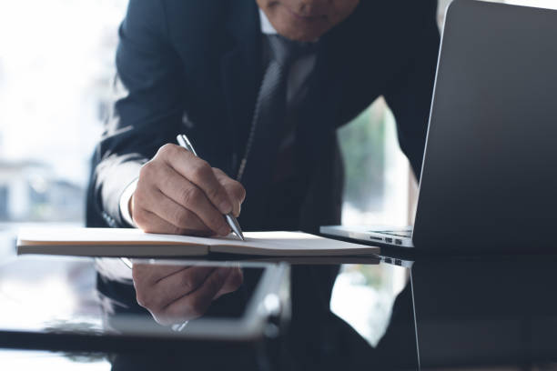 istock Businessman working in modern office 1345666348