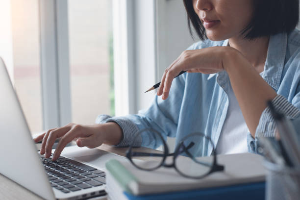 istock Business woman working from home office 1345667913